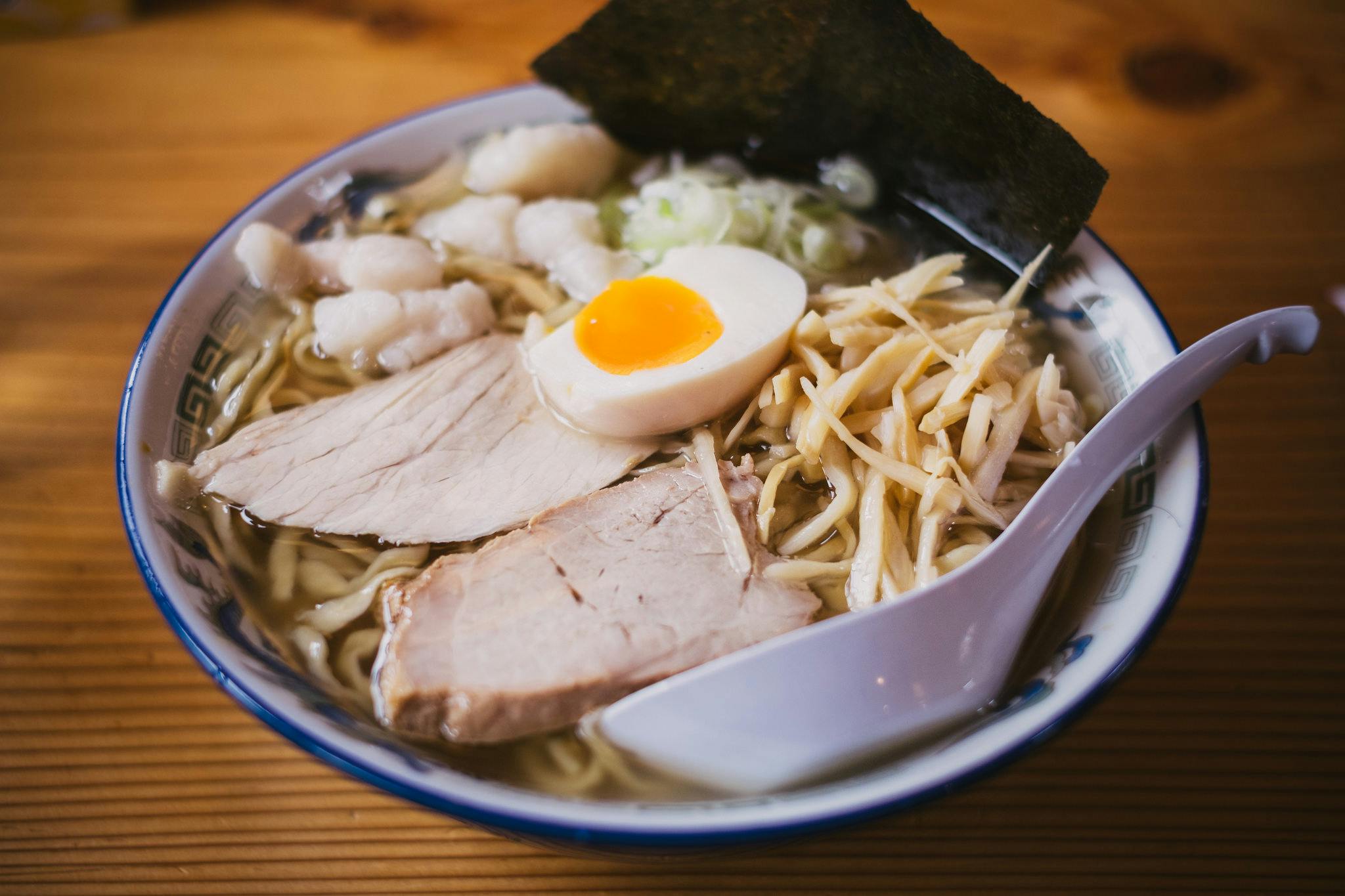 A steaming bowl of authentic ramen, part of the diverse menu at Yashima.